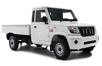 White utility pickup truck with a flatbed, shown from a slight front-right angle against a black background